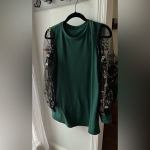 Green dress with floral sleeves